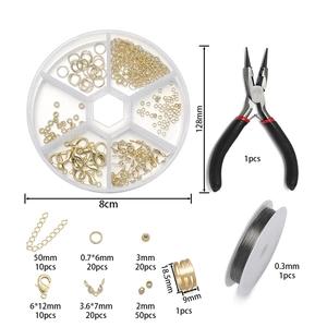 DIY jewelry making kit with gold lobster clasps and long nose pliers in a round box