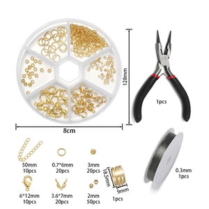 DIY jewelry kit with gold findings, pliers, wire, and round storage box for crafting