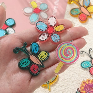 Colorful acrylic DIY pendants featuring hand-painted flowers and butterflies on palm