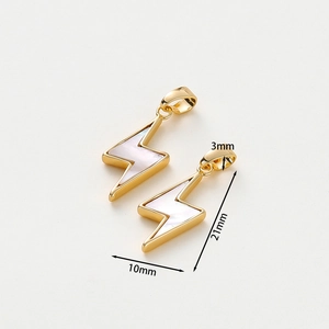 Detail of lightning bolt shell pendant with size measurements 21mm by 10mm in gold finish