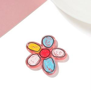 Detailed view of a sweet floral acrylic pendant for DIY crafts and phone case decoration