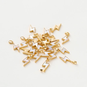Macro detail of lightning shell pendants with 18K gold plating for DIY jewelry making