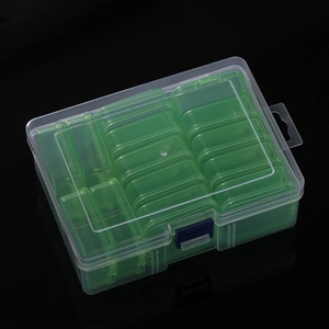Detailed view of 14-compartment bead storage box with green mini cases and blue safety latch