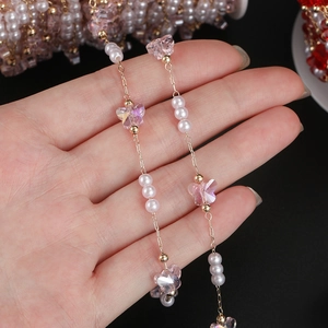 DIY gold chain with white pearls and pink crystal butterflies for handmade jewelry crafts