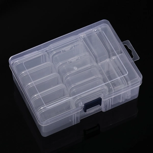 Macro view of 14-grid clear plastic storage box with blue buckle and internal sorting bins