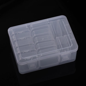 Close-up of 14-compartment transparent plastic organizer box for beads and small parts