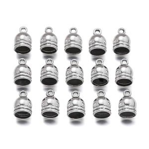 Matrix of silver zinc alloy bell-shaped cord end caps with top hanging loops for jewelry diy