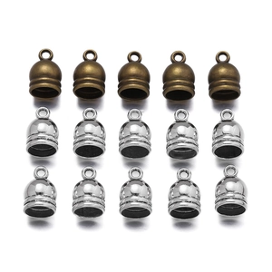 Detailed grid of antique bronze and silver crown tassel end caps for DIY jewelry