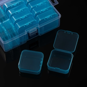 Detail of 14-grid blue transparent plastic storage box for beads and components