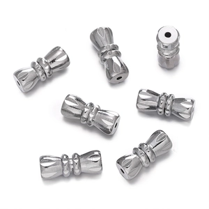 Macro view of silver faceted screw clasps for handmade pearl necklace jewelry making
