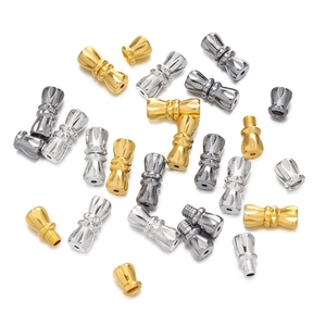 Detailed macro shot of copper screw clasps in gold silver and gun grey for DIY jewelry