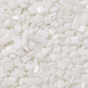 Macro view of white square Tila beads with dual parallel holes for DIY jewelry