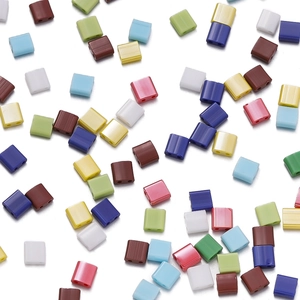 Macro detail of colorful double-hole square glass beads with smooth glazed finish