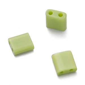Close-up of matte matcha green dual-hole glass beads for DIY jewelry making