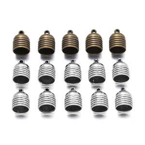Zinc alloy bell end caps with ribbed texture and hanging loops for jewelry making