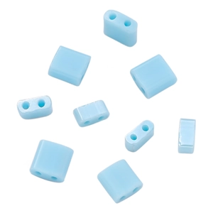 Macro detail of light blue square glass beads with double holes for DIY jewelry making