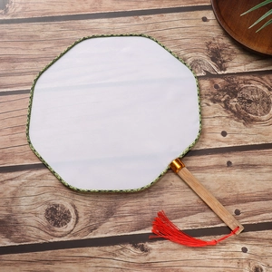 Octagonal white silk hand fan with natural wood handle and vibrant red silk tassel