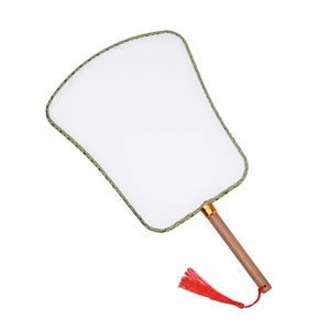 Detail of white DIY fan with green patterned edge, wooden handle, and red tassel decor