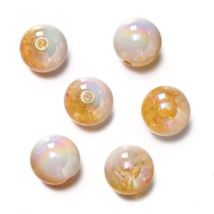 Macro shot of 16mm iridescent gradient acrylic beads with colorful snowflake finish