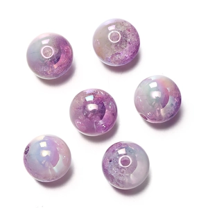 Macro shot of 16mm purple crackle acrylic beads with colorful UV gradient finish