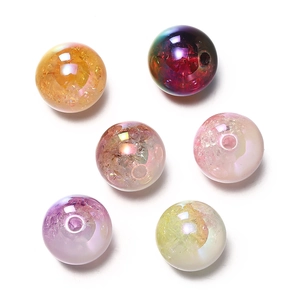Macro detail of 16mm acrylic beads with internal ice crackle texture in assorted colors