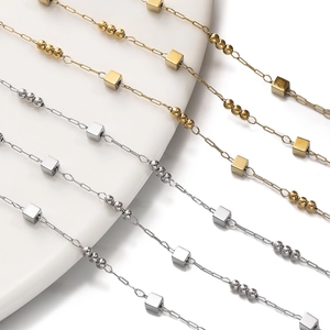 Close-up of gold and silver square cube link chains for DIY jewelry making accessories