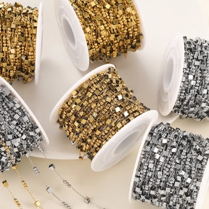 Detail of vacuum-plated stainless steel cube and bead chains for DIY jewelry making