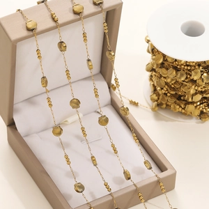 Golden stainless steel shell and bead chain for DIY jewelry making displayed on a gift box