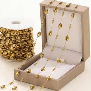 Macro view of gold plated oval bead chain link for DIY jewelry necklace making