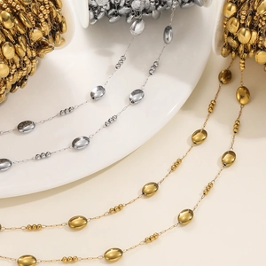 Detailed view of gold and silver oval bead chains for DIY jewelry making