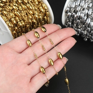 Detail of stainless steel oval bead chain for jewelry making in gold and silver finish