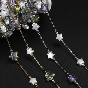 Detail of 18K gold star acrylic beaded chain for DIY jewelry making and earring crafts