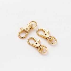 Close-up of 14K gold plated lobster clasps with 360-degree swivel for DIY keychains