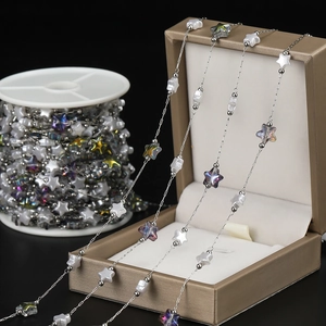 Detailed macro of 18K gold-plated star acrylic chain for DIY jewelry making material