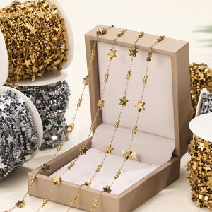 Detailed view of DIY star and bead chains in gold and silver finish for jewelry making