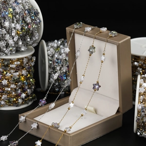 Detailed shot of 18K gold star acrylic beaded chain for DIY jewelry making and earrings