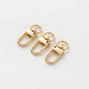 Tre chiusure a moschettone a cuore in oro 18K con anelli rotanti per gioielli fai da te