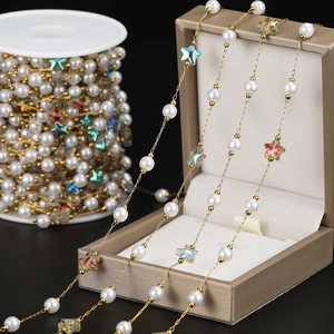 Detail of 18K gold-plated star and pearl chain for DIY jewelry making and earrings