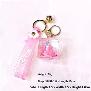Macro detail of pink Capybara oil liquid quicksand keychain with sweet heart strap