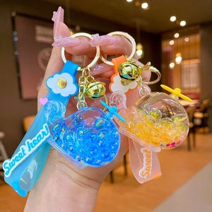 Luminous whale liquid keychain with helicopter propeller and colorful glitter beads