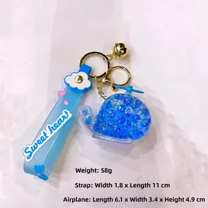 Blue helicopter keychain detail showing 58g weight, dimensions, and sweet heart strap