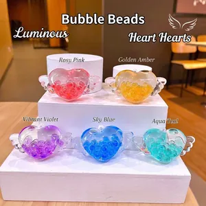 Grazioso Ciondolo a Forma di Bottiglia di Sabbia Mobile con Ali d'Angelo a Cuore Perline Luminose Ciondolo Borsa Regalo Senza Portachiavi