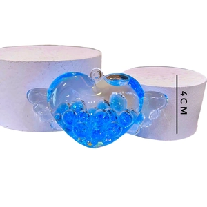 Portachiavi carino con cuore d'angelo e ali con perline blu fluttuanti, altezza 4cm