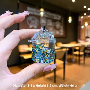 Porte-clés mini boisson acrylique avec paillettes étoiles colorées et bouteille de sables mouvants