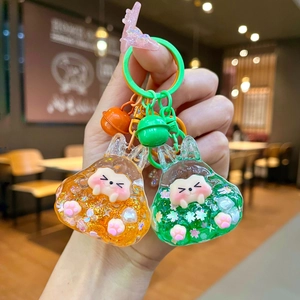 Luminous glitter liquid oil keychain with cartoon animal shapes and colorful charms