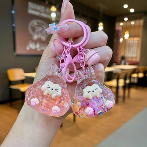 Luminous glitter bunny oil keychain with pink metal ring and bell for school bag