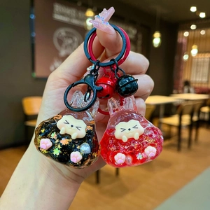 Luminous glitter bunny oil keychain with liquid sand and stars in black and red