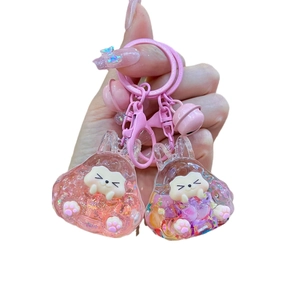 Sparkly pink rabbit liquid quicksand keychains with glitter and colorful sequins