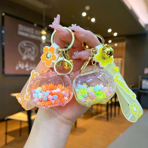 Kawaii TV quicksand keychain with colorful beads, snowflakes and sakura rubber strap