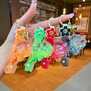 Creative sakura lollipop liquid keychain set in five colors with glitters and charms